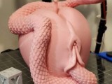 The tempter is a snake made from an Apple -0