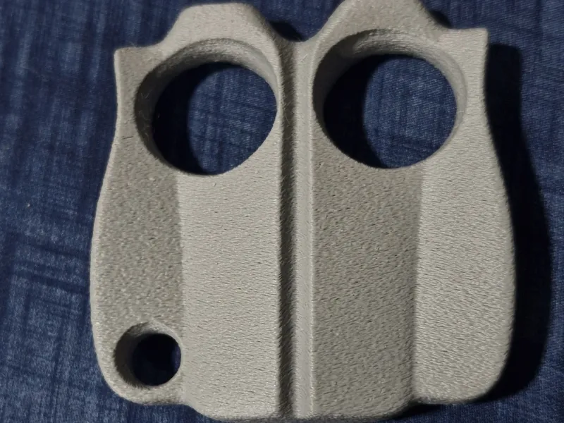 Ergonomische boksbeugelsleutelhanger voor twee vingers