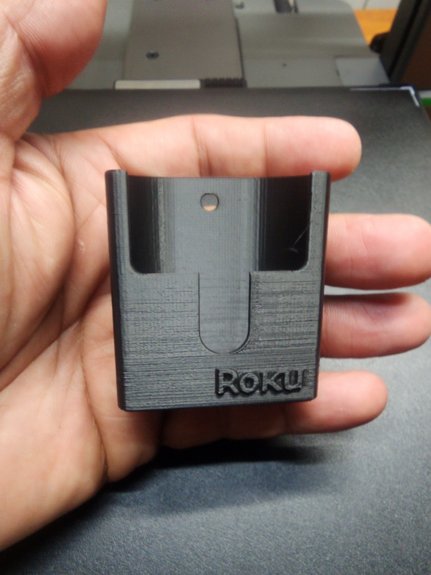 this roku remote holder is awesome, says roku on it. very cool design ...