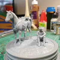 Cowboy sitting next to his horse (7) - Old West Figure mini-0