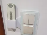 Remote Control holder attached to the light switch-0